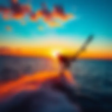 A vivid sunset view of a wingboarder gliding over the water