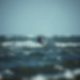 Winter kiteboarding action on turbulent waves